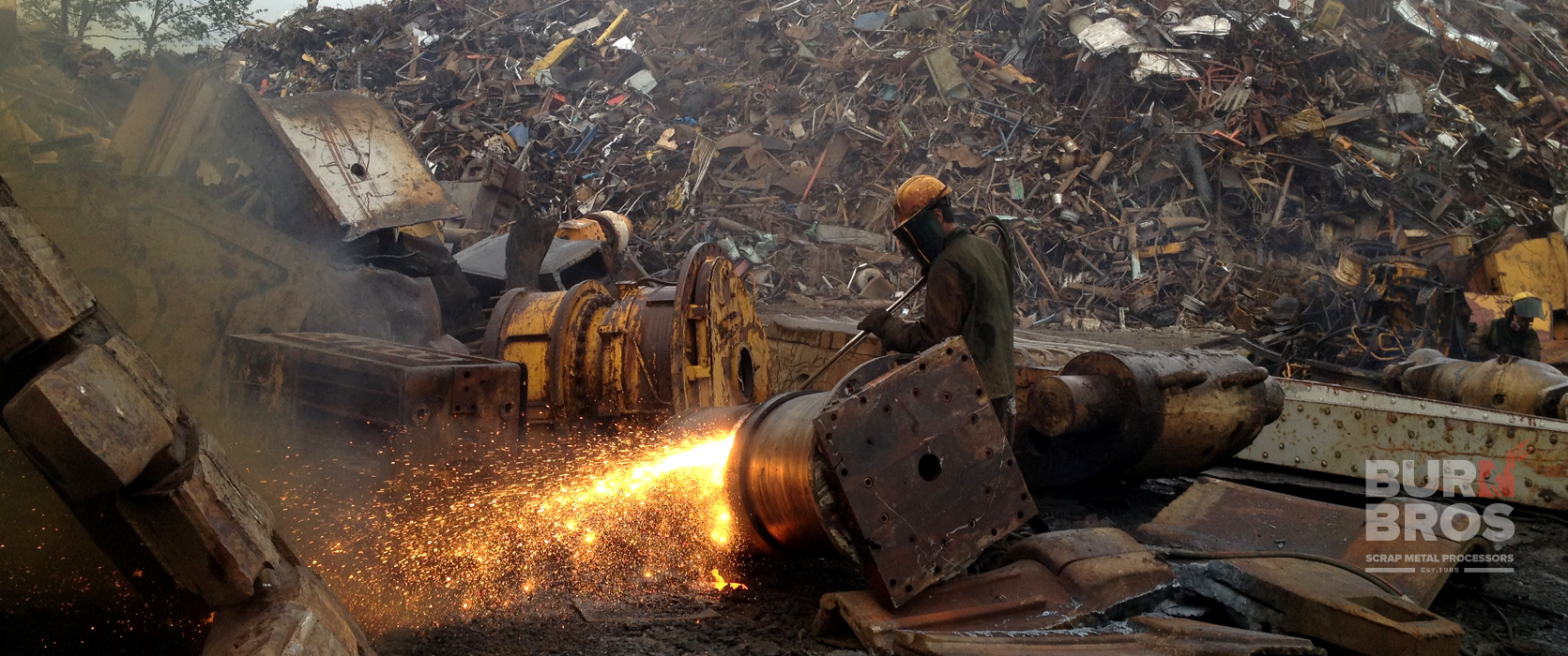 Torchman cutting steel and material (sparks everywhere)