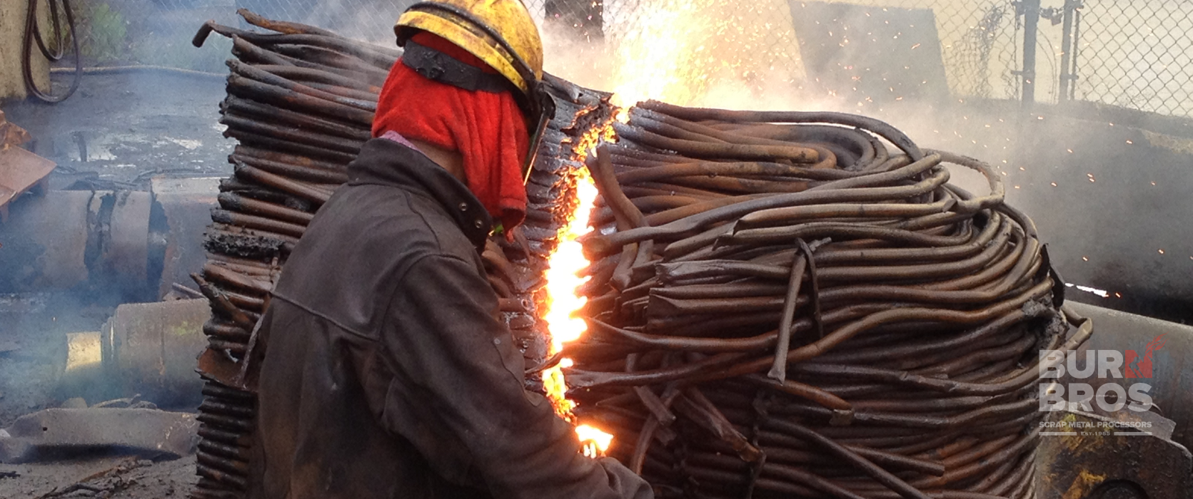 Picture of an oversized copper industrial heat exchanger cut to specification using a bazooka torch